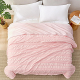 Discover the Cozy Bliss Seersucker Cooling Comforter for Hot Sleepers